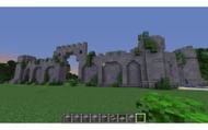 By adding foliage and mossy cobblestone, players can make their archway look overgrown (Image via Reddit/Lavashrimp)
